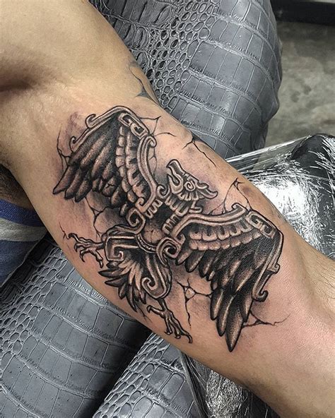 Aztec eagle warrior tattoo - For instance, the Aztec eagle tattoo, a popular design, symbolized strength and bravery, often associated with warriors and nobility. Similarly, the Aztec dragon tattoo, representing a mythical creature, was seen as a symbol of power and wisdom. ... For example, an Aztec warrior tattoo might be combined with a family crest or initials to ...